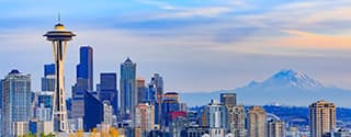 Aerial view of downtown Seattle, the waterfront, and Elliott Bay.