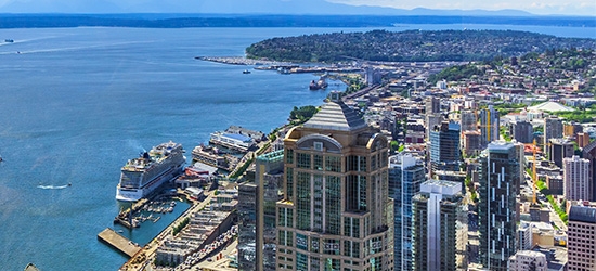 Aerial view of downtown Seattle, the waterfront, and Elliott Bay.