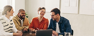 Coworkers sitting at a conference table