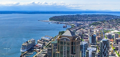 Aerial view of downtown Seattle, the waterfront, and Elliott Bay.
