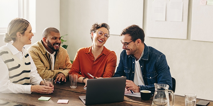 Coworkers sitting at a conference table