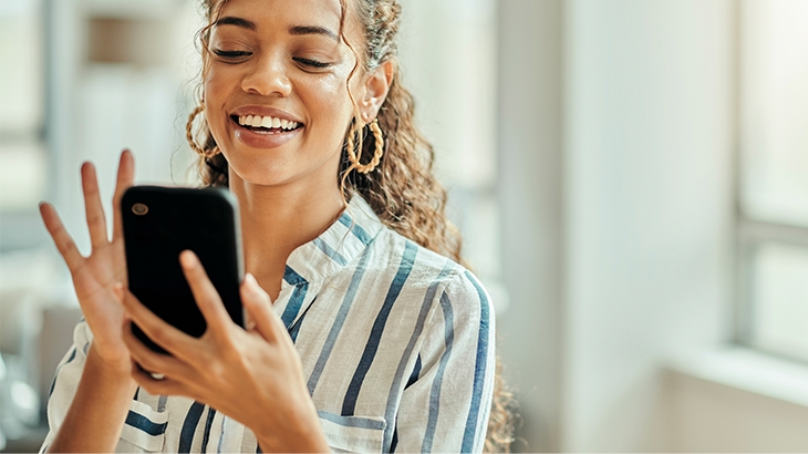 Woman on mobile looking at social media.