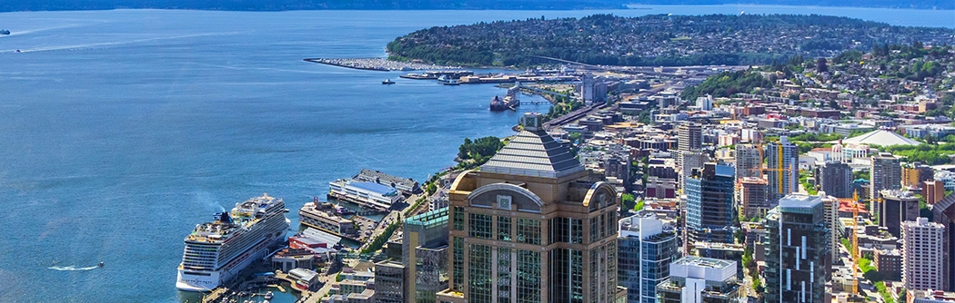 Aerial view of downtown Seattle, the waterfront, and Elliott Bay.