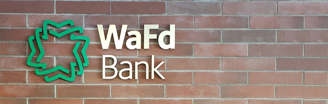 WaFd Bank sign on a brick wall