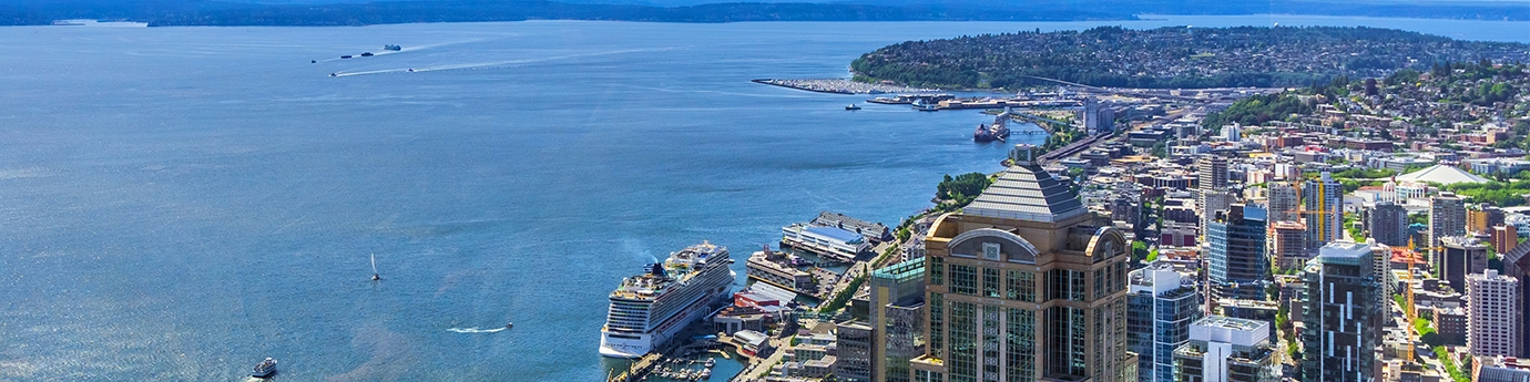 Aerial view of downtown Seattle, the waterfront, and Elliott Bay.