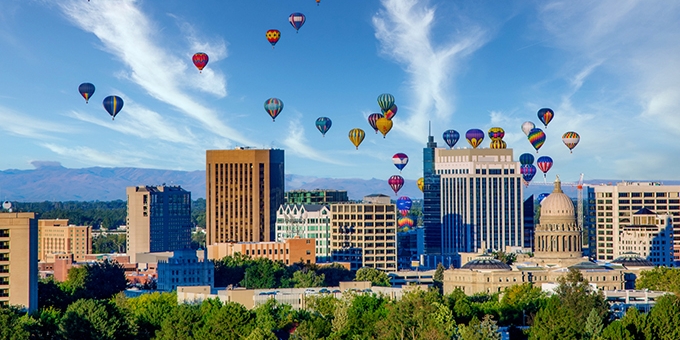 Downtown skyline in Boise, Idaho with hot air balloons