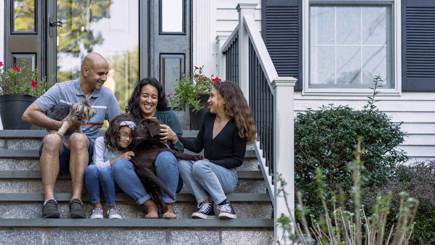 Family in front of their house