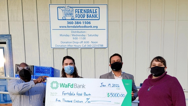 WaFd employees presenting a check at the Foundation Ferndale Food Bank