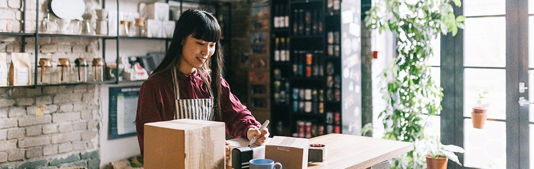 Young entrepreneur shipping products.