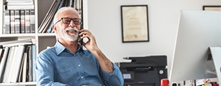 Senior businessman on mobile phone