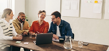 Coworkers sitting at a conference table