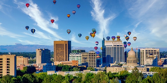 Downtown skyline in Boise, Idaho with hot air balloons