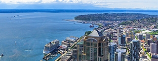 Aerial view of downtown Seattle, the waterfront, and Elliott Bay.