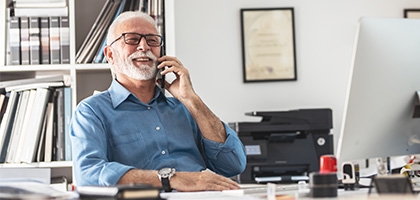 Senior businessman on mobile phone