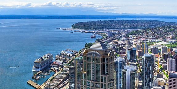 Aerial view of downtown Seattle, the waterfront, and Elliott Bay.