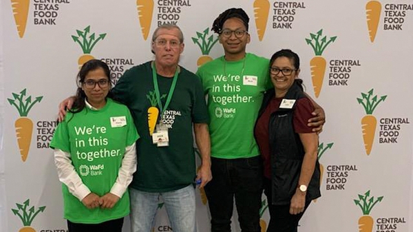 WaFd employees volunteering at the Central Texas Food Bank.