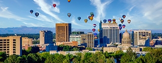 Downtown skyline in Boise, Idaho with hot air balloons